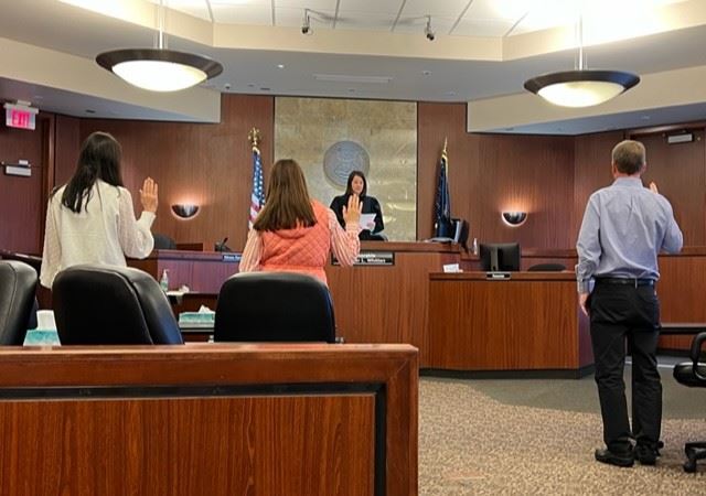 Judge Whitten swearing in CASA volunteers